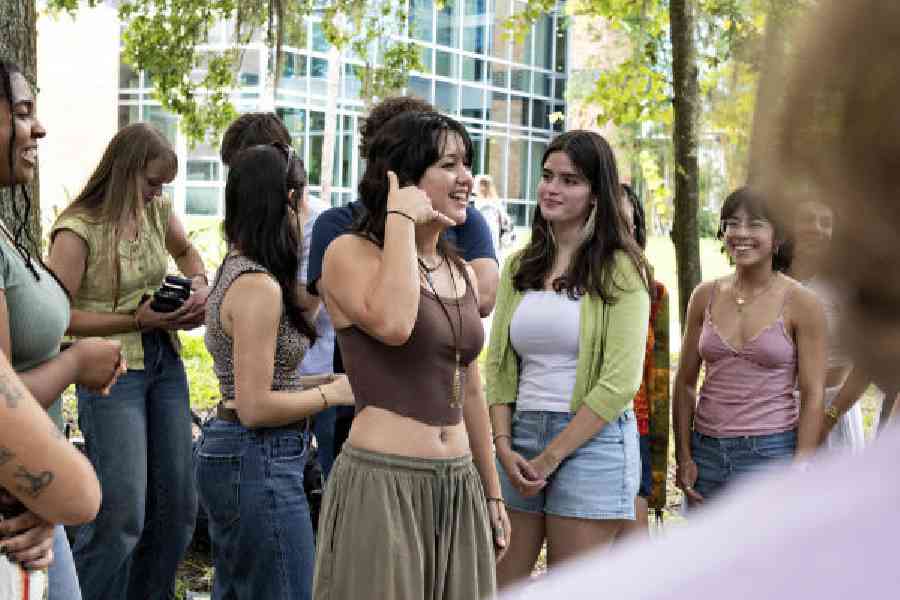 Mia Shaffner, president of the Reconnect Movement at the University of Central Florida, encourages everyone to call each other instead of texting after a group meeting on the university’s campus in Orlando