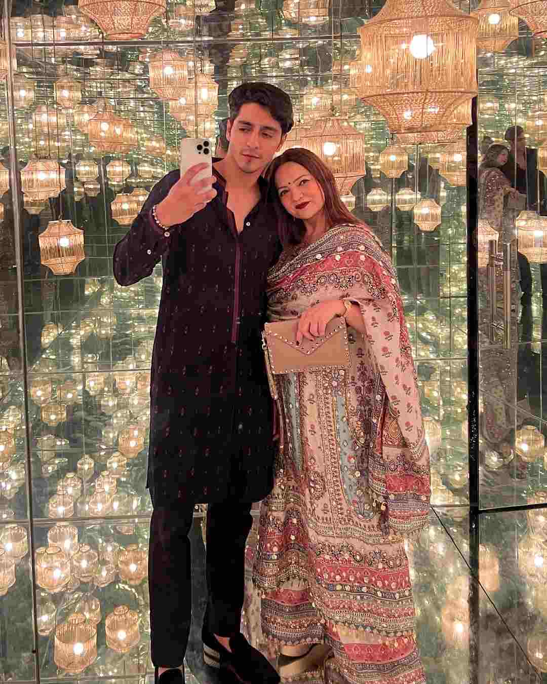 Saiyaara star Ahaan Panday looked handsome in a black kurta as he posed for a photo with his mother Deanne Panday. 