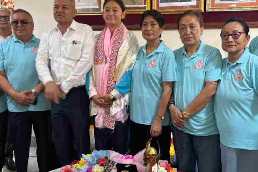Abhista Basnett with the representatives of Sikkim government and Sikkim Football Association at Rangpo on Monday