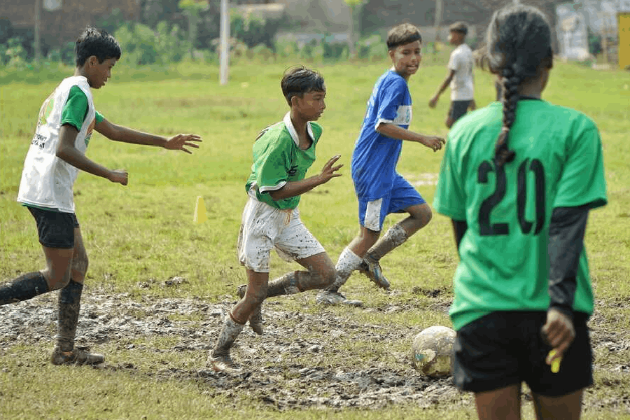 Arpita Das (centre) a confident 11-year-old playmaker, has the full support of her father, who dreamt of going pro