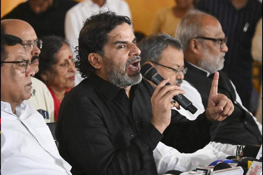 Jan Suraaj chief Prashant Kishor addresses a press conference ahead of Bihar Assembly polls, in Patna, Tuesday, Oct. 21, 2025.