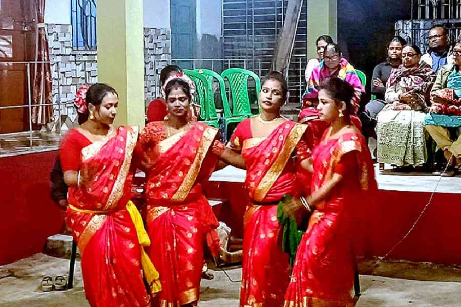 Women perform their traditional tribal dance