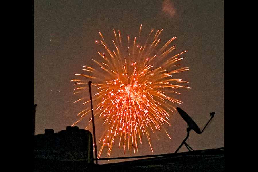 Fireworks in the city sky near Sovabazar Metro station on Diwali night
