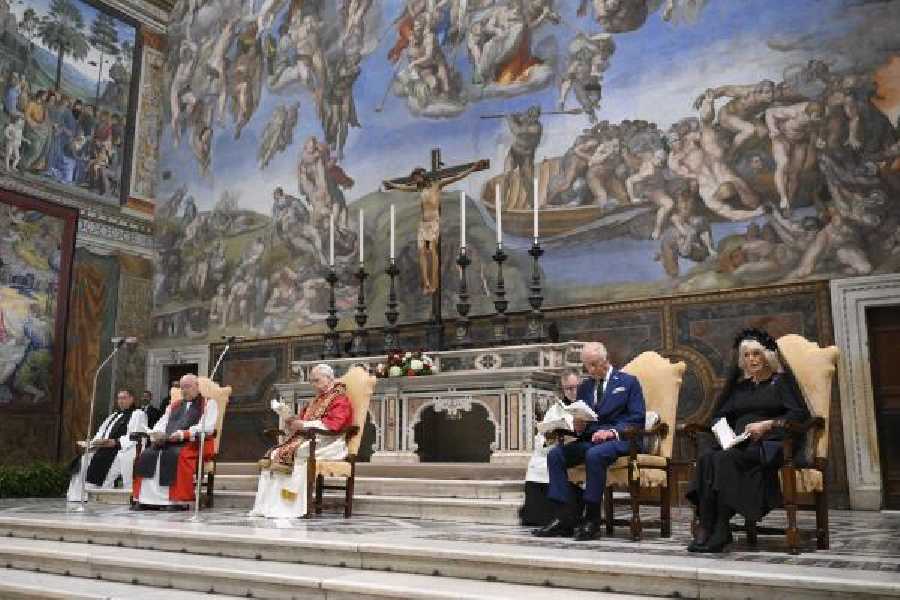 Pope Leo XVI, King Charles III and Queen Camilla attend the prayer service at the Sistine Chapel on Thursday.