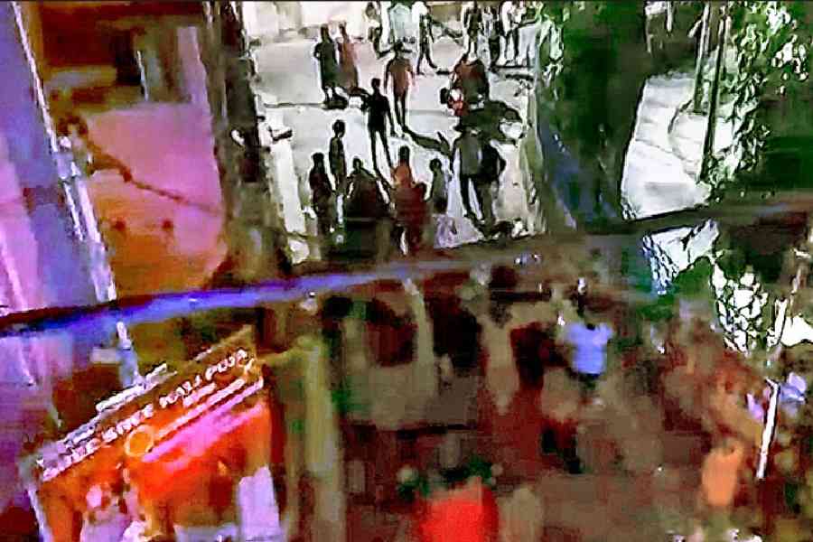 A still from a video shows some of the Kali Puja committee members involved in Thursday night’s alleged attack