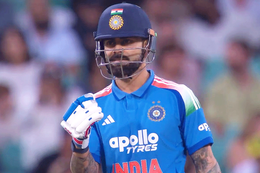 Virat Kohli celebrates his first run on Saturday, October 25, 2025.