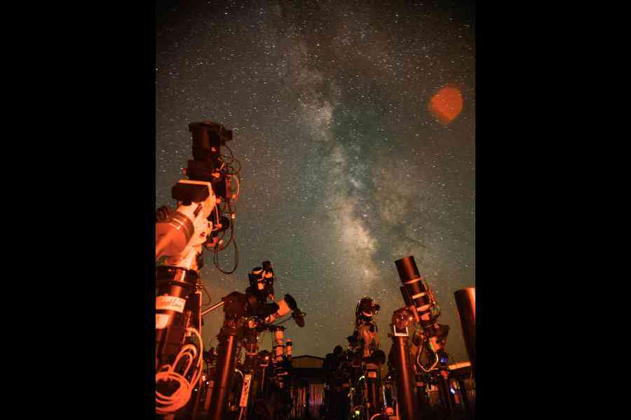 PARKING LOT: Telescopes lined up at Starfront Observatories