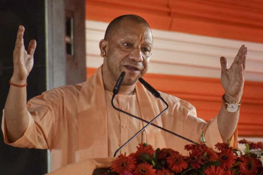 Yogi Adityanath at the event in Lakhimpur Kheri on Monday.