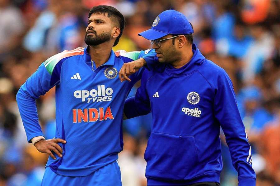 Shreyas Iyer exits the field, in a picture shared on X, after injuring himself during the Sydney ODI
