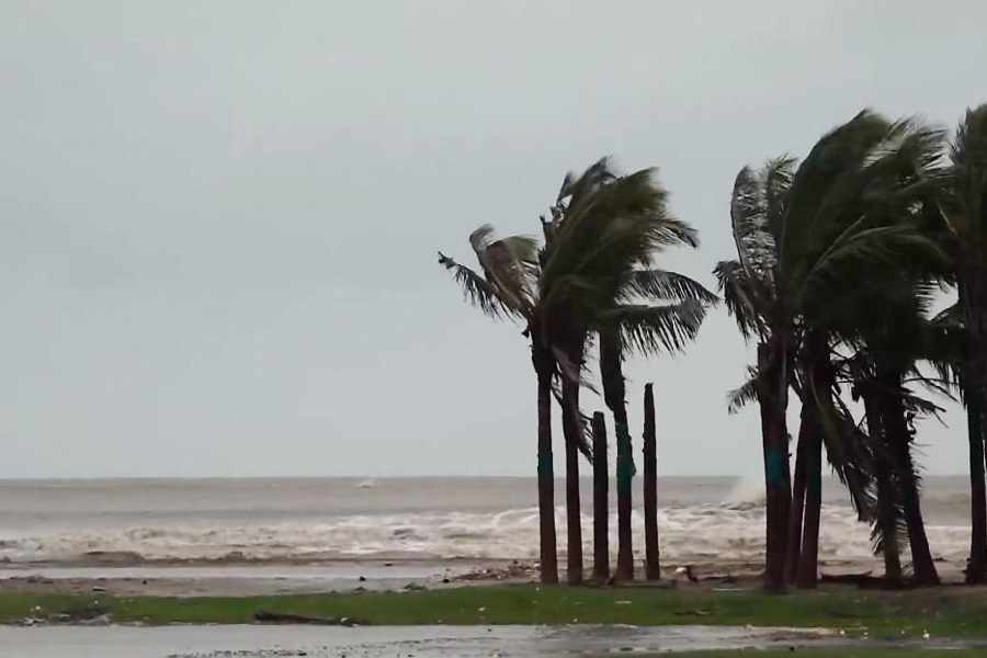 Sea waves crash against the shore amid strong winds ahead of the landfall of Cyclone 'Montha', at Manginapudi beach