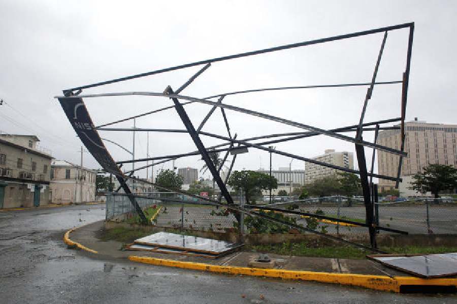 A hoarding frame bent out of shape in Kingston, Jamaica, on Tuesday as Hurricane Melissa makes landfall.