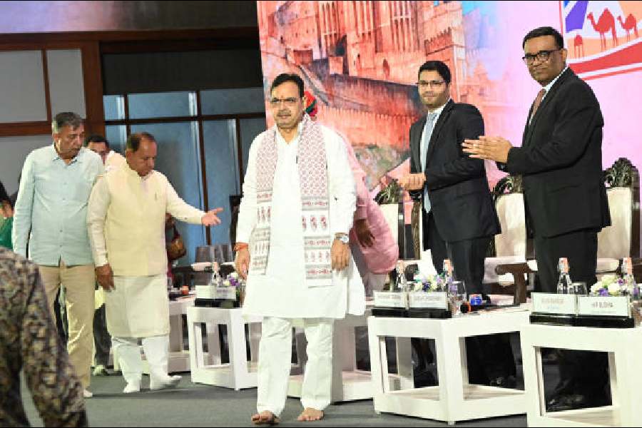(From left) Bhajan Lal Sharma, Shashwat Goenka and Umesh Chowdhary in Kolkata on Tuesday.