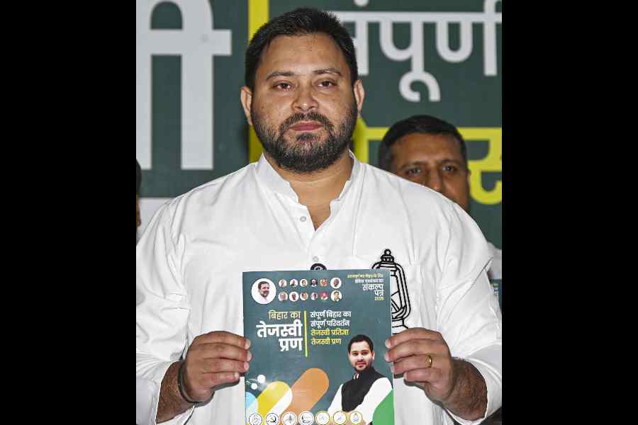 Tejashwi Yadav releases the manifesto in Patna on Tuesday.