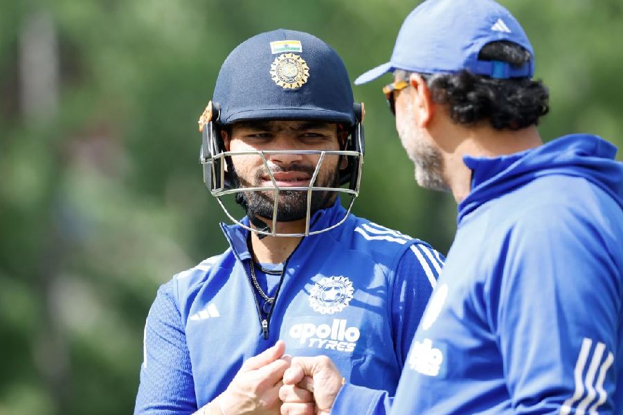 Rinku Singh with a member of the support staff aheadof the Australia T20Is.