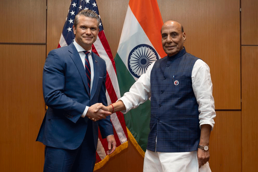 Defence Minister Rajnath Singh with United State's Secretary of War Pete Hegseth during a meeting to sign a 10-year U.S.-India Defense Framework, in Malaysia.