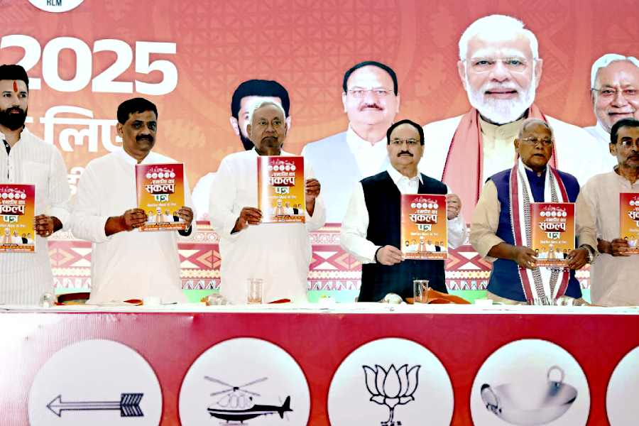 JP Nadda with Chirag Paswan, Bihar CM Nitish Kumar and Sanjay Jha releases the NDA's manifesto for the upcoming Bihar Polls