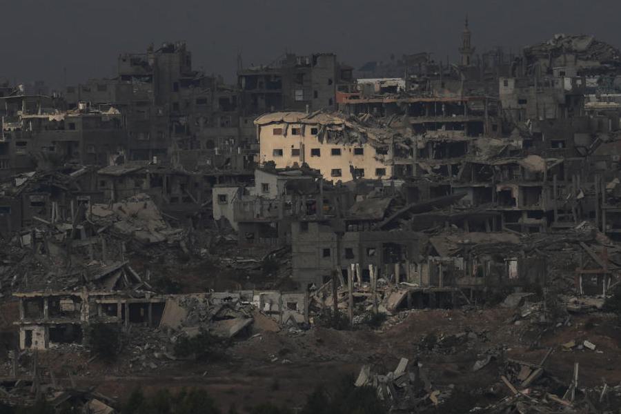 Buildings destroyed during Israeli ground and air operations stand in the Gaza Strip, as seen from southern Israel, Wednesday, Oct. 29, 2025.