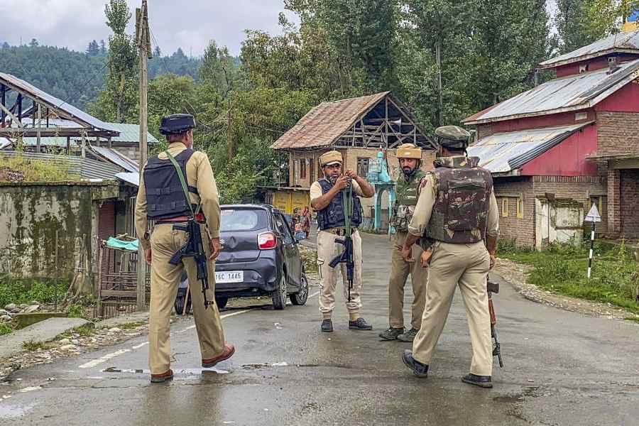 Police personnel at the site after an encounter broke out between terrorists and security forces in the Kulgam district, Monday, Sept. 8, 2025.