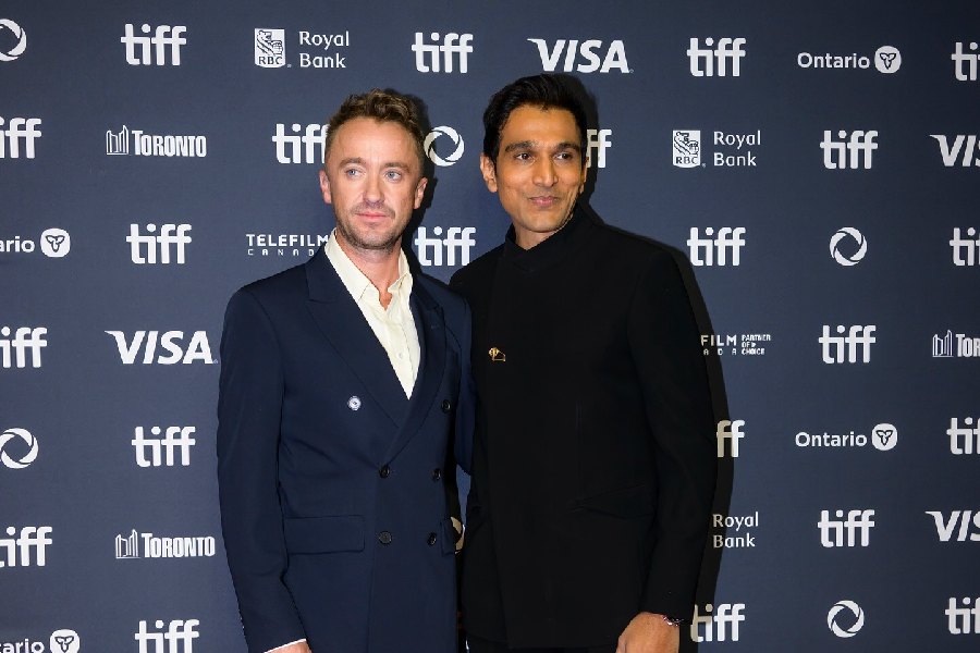 (left to right) Tom Felton and Pratik Gandhi at TIFF