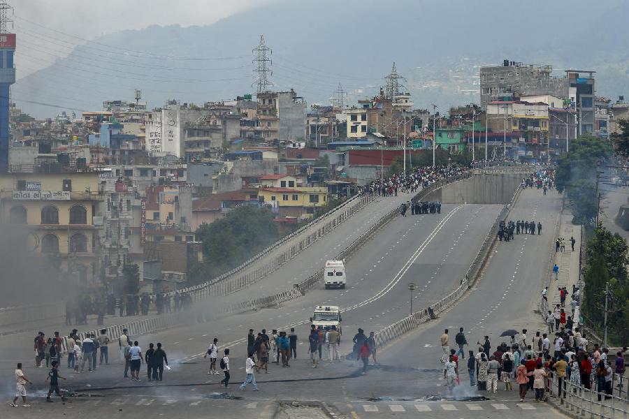 Nepal's security personnel stand guard amid massive anti-government protests, in Kathmandu, Nepal, Tuesday, Sept. 9, 2025. Nepalese Prime Minister KP Sharma Oli resigned amid the protests.