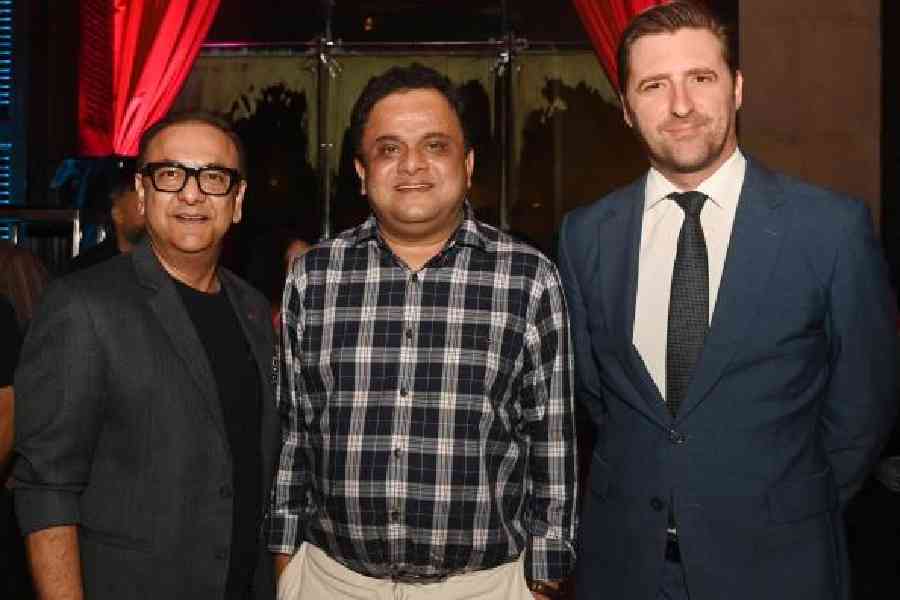 Arvind Sukhani with minister Bratya Basu (centre) and Nicolas Facino