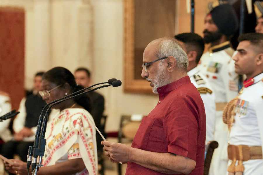 President Droupadi Murmu administers the oath of office of the Vice-President of India to CP Radhakrishnan during a swearing-in ceremony, at Rashtrapati Bhavan, in New Delhi, Friday, Sept. 12.