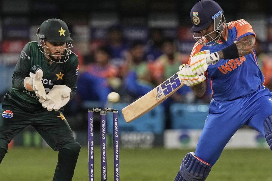 India's captain Suryakumar Yadav plays a shot during the Asia Cup cricket match between India and Pakistan at Dubai International Cricket Stadium in Dubai, United Arab Emirates, Sunday, Sept. 14, 2025.