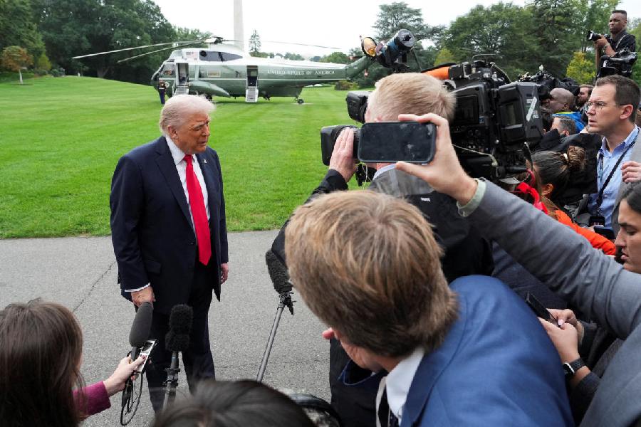 US President Donald Trump speaks to the media before departing for a state visit to Britain, at the White House in Washington, DC, US, September 16, 2025.