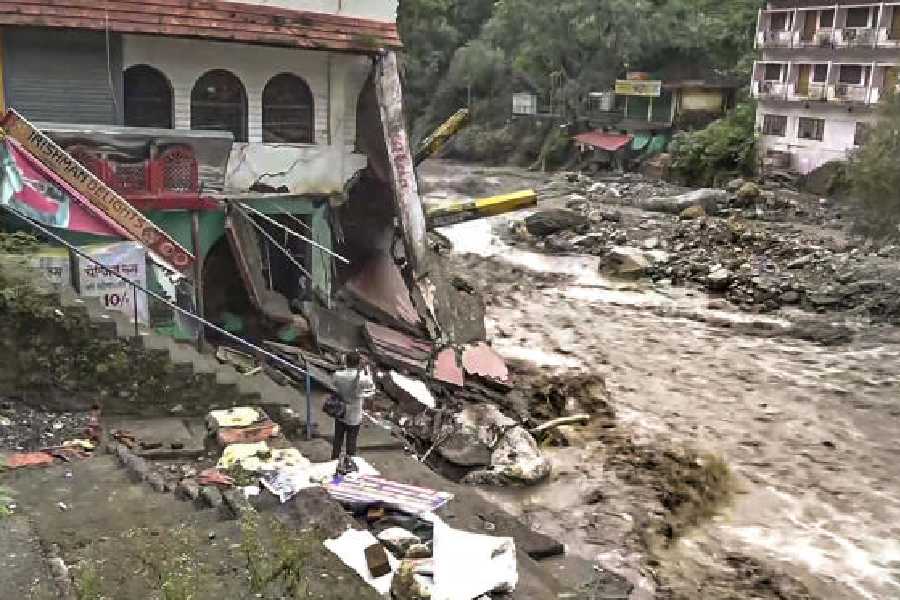 A damaged building in Dehradun on Wednesday following cloudbursts and heavy rain.