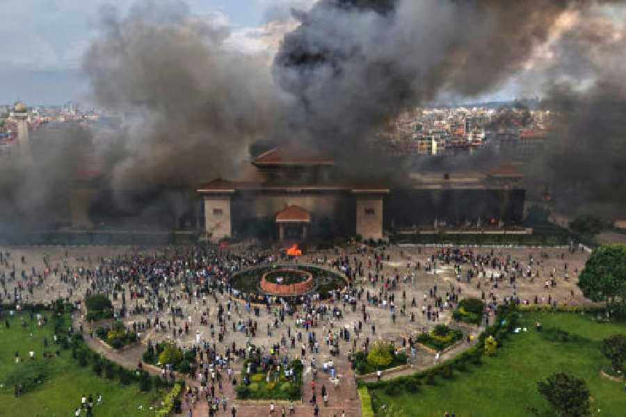 Singha Durbar up in flames during the protests in Kathmandu.