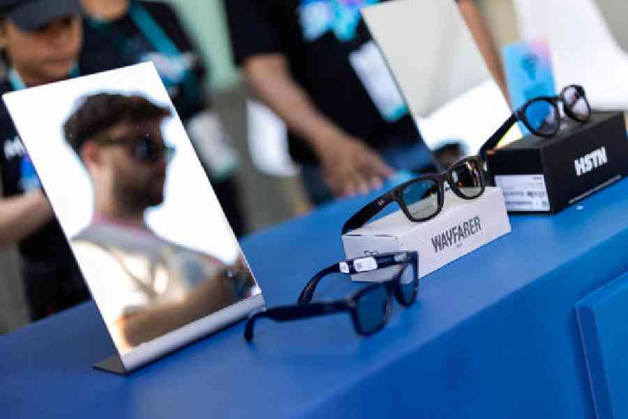 A visitor reviews the new Meta smart glasses during the Meta annual Connect conference