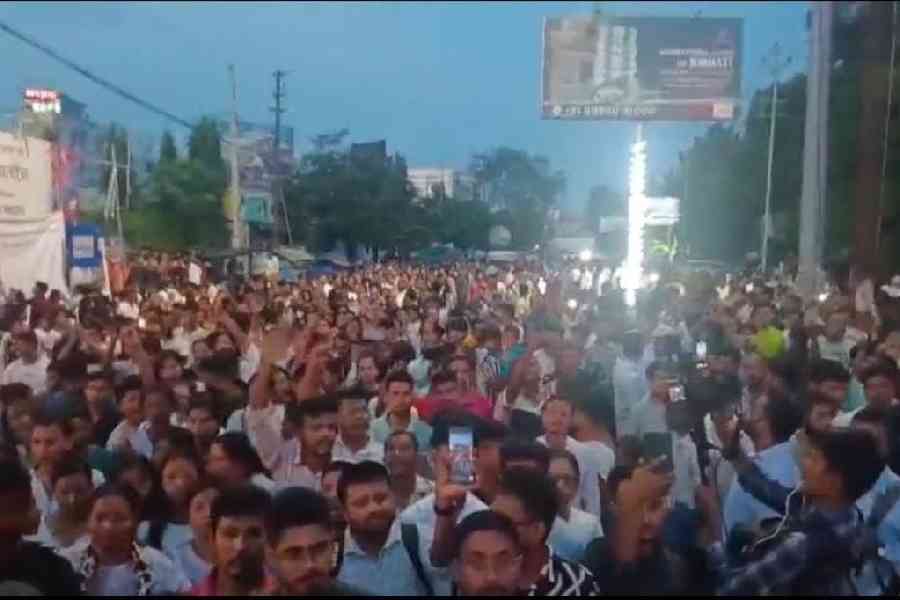 Fans throng a street in Jorhat, Assam, to pay tribute to Zubeen Garg on Saturday evening