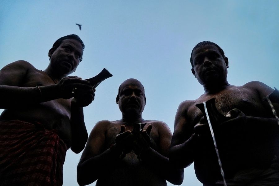 Elders leading the ritual, youth learning, each one offering prayers on Mahalaya morning