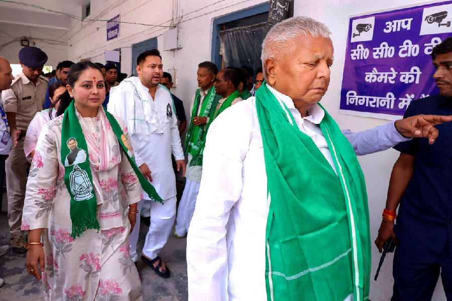 RJD chief Lalu Prasad Yadav with his daughter and party candidate from Saran constituency Rohini Acharya during filing of her nomination for Lok Sabha elections, at Chapra in Saran district, Monday, April 29, 2024.