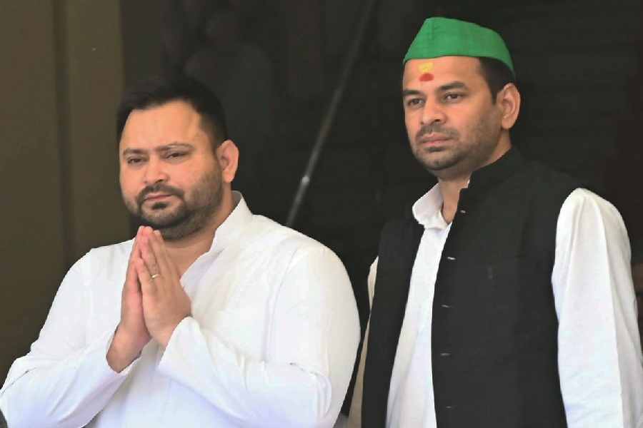 RJD leader Tej Pratap Yadav with party leader Tejashwi Yadav arrives to attend Budget session of the state Assembly, in Patna