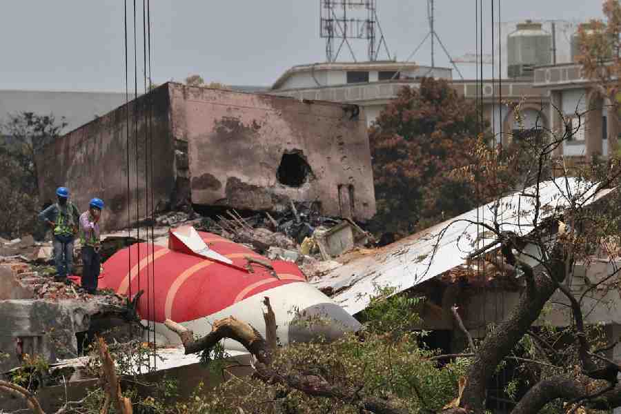 Members of Indian Army's engineering arm prepare to remove the wreckage of an Air India aircraft, bound for London's Gatwick Airport, which crashed during take-off from an airport in Ahmedabad, India June 14, 2025.