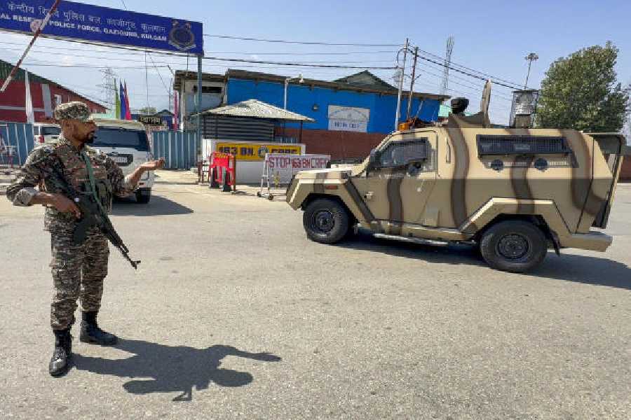 A soldier keeps vigil during the visit of CRPF director-general GP Singh to Anantnag on Tuesday.