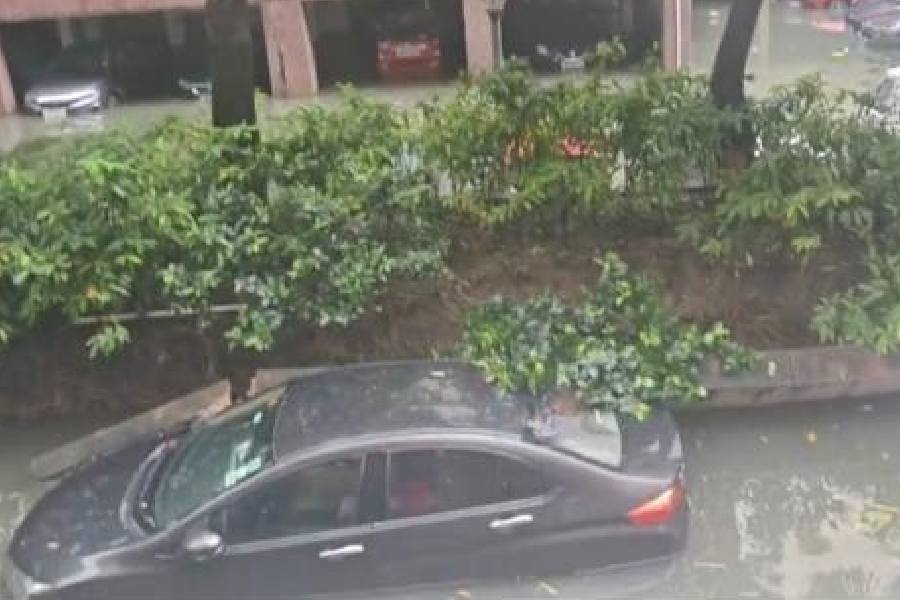 A half-submerged car in Udita Housing Complex on Wednesday