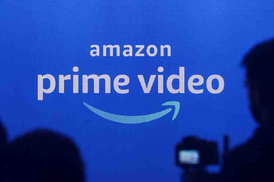 Media are seen in front of an Amazon Prime Video logo during an Amazon Prime Video India launch event in Mumbai, India, April 28, 2022.