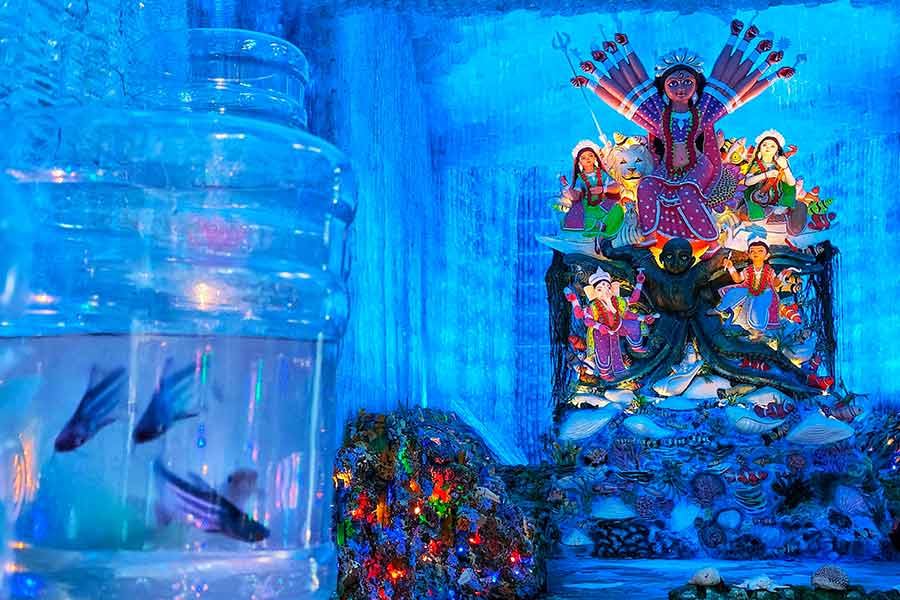 Designed to resemble an underwater aquarium, this north Kolkata pandal draws attention to the global menace of sea pollution. This crisis has become a cause for alarm among scientists and environmentalists worldwide