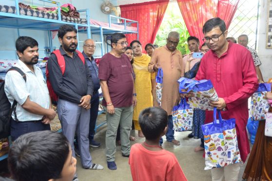 To make the day even more memorable, the children were gifted new festive clothes and treated to a delicious lunch arranged by the institution.