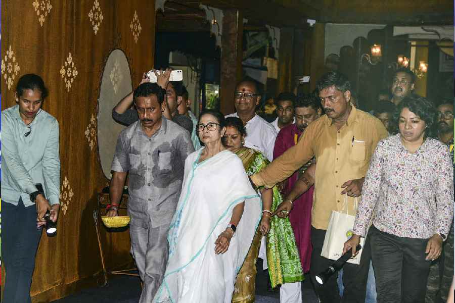 In this image received on Sept. 24, 2025, West Bengal Chief Minister Mamata Banerjee during the inauguration of the grand Durga Puja pandal of Bhowanipur 75 Palli, marking the beginning of the committee’s 61st year of celebrations