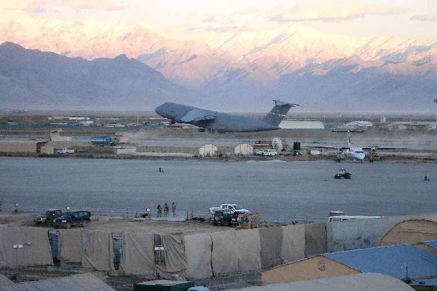 A C-5 Galaxy takes off from a runway at Bagram Air Base, Afghanistan