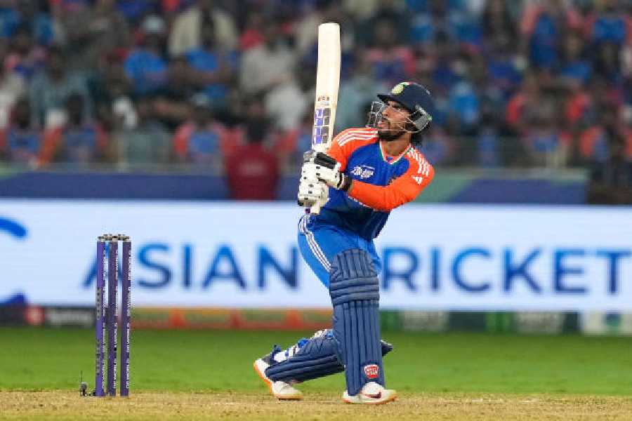 Tilak Varma hits one of his four sixes in the final in Dubai on Sunday. (AP/PTI)