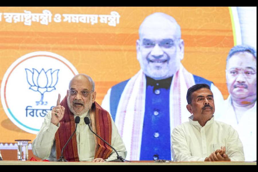 Union home minister Amit Shah and Suvendu Adhikari at a press conference in Kolkata