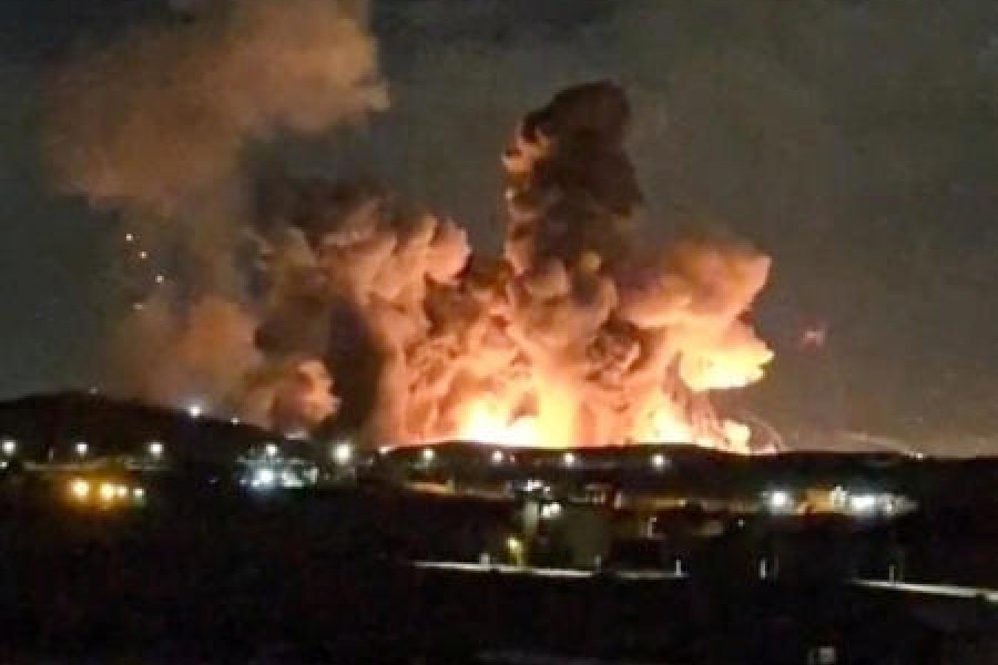 Columns of smoke and fire rise to the sky following the explosion in Isfahan, Iran, on Tuesday