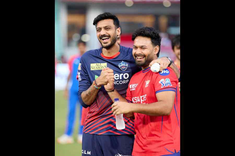 Captains Axar Patel and Rishabh Pant have a laugh before Delhi Capitals and Lucknow Super Giants take on each other in Lucknow on Wednesday.