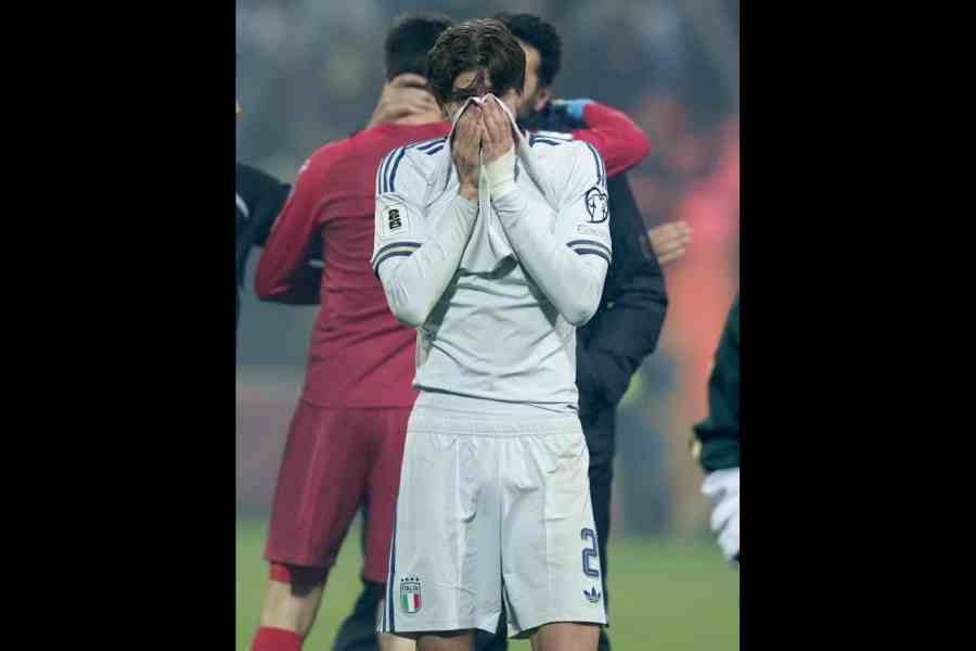 Italy's Marco Palestra looks dejected after the match after failing to qualify for the FIFA World Cup.