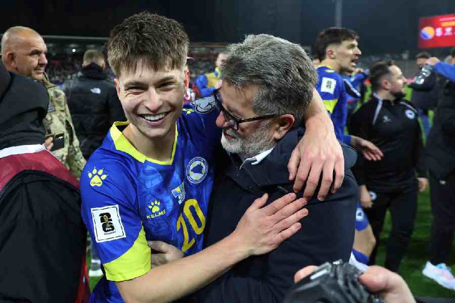 Bosnia and Herzegovina's Esmir Bajraktarevic celebrates scoring their winning penalty in the penalty shootout to qualify for the FIFA World Cup.