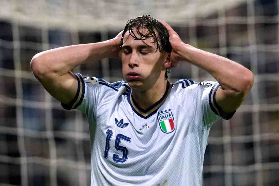 Italy's Pio Esposito reacts during extra time